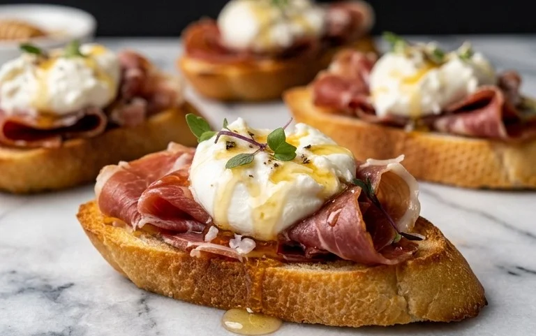 Beef Prosciutto Crostini with Burrata and Lemon Honey Drizzle